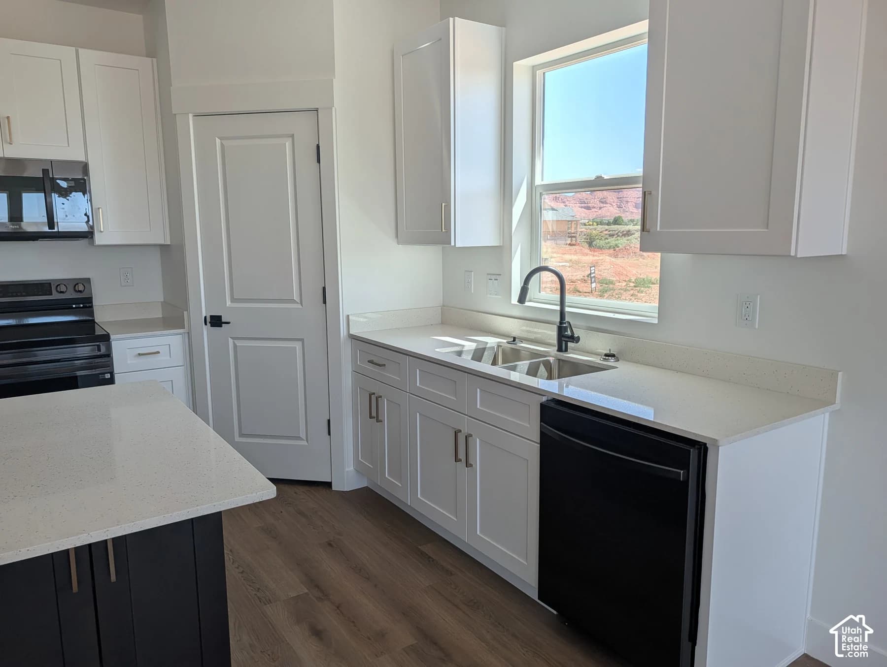 Kitchen in a completed example of our three-bedroom home design
