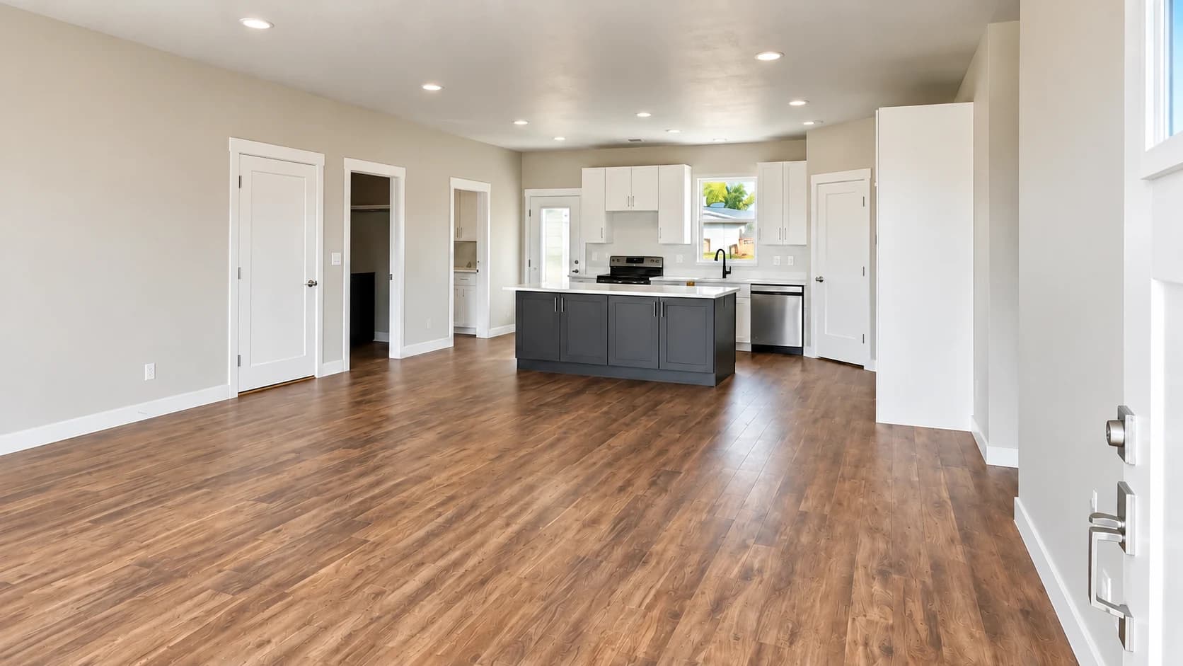 Main home open living area and island kitchen